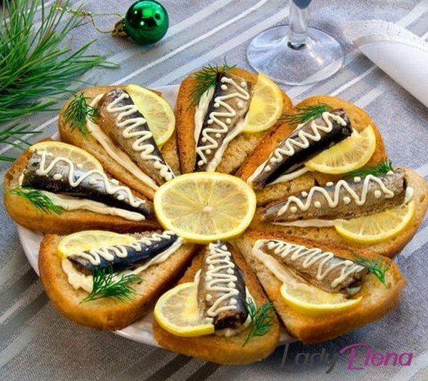 Бутерброды со шпротами и лимоном